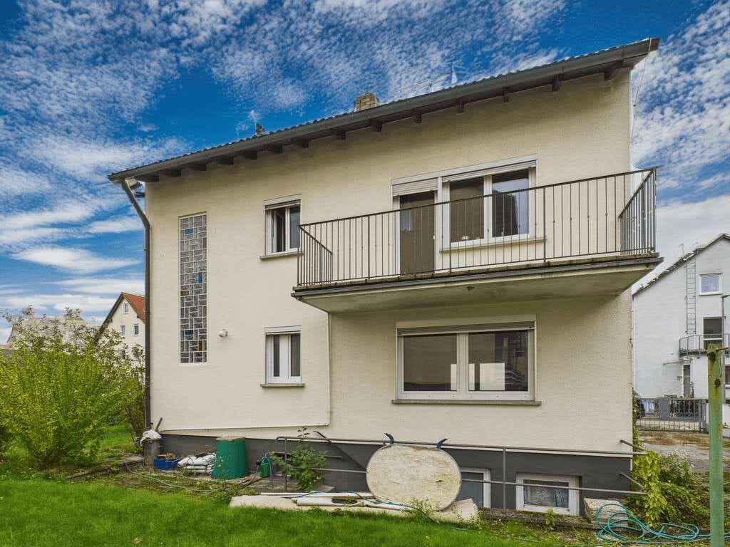 Immobilie in Strullendorf - Geräumiges Wohnhaus mit Balkon und Garten – bereit für Ihre Ideen - Bild 2