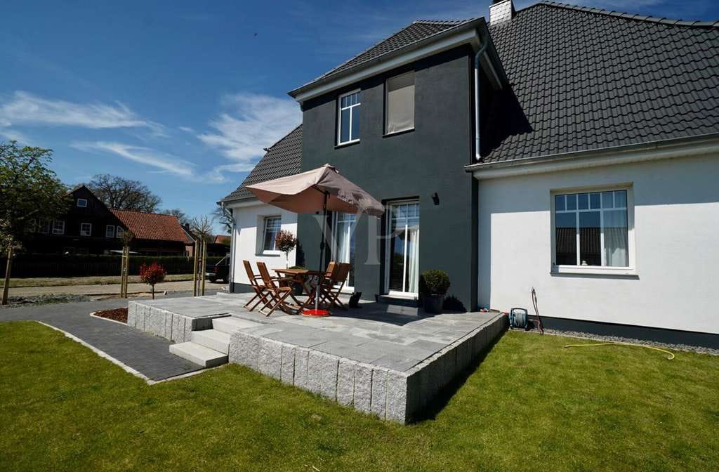 Immobilie in Groß Oesingen - SOLIDES MEHRFAMILIENHAUS MIT VIER WOHNEINHEITEN -  NACHHALTIG MODERNISIERT UND VOLL VERMIETET - Bild 1