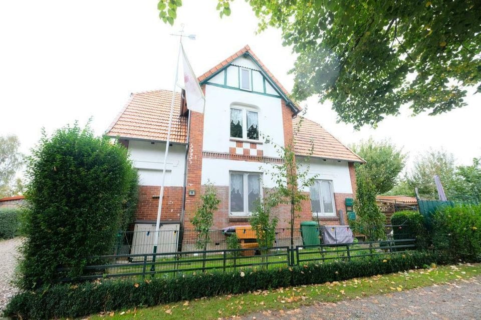 Immobilie in Lensahn - DAMLOS - Zweifamilienhaus in ruhiger Lage mit eigenem Garten und Doppelcarport - Bild 0