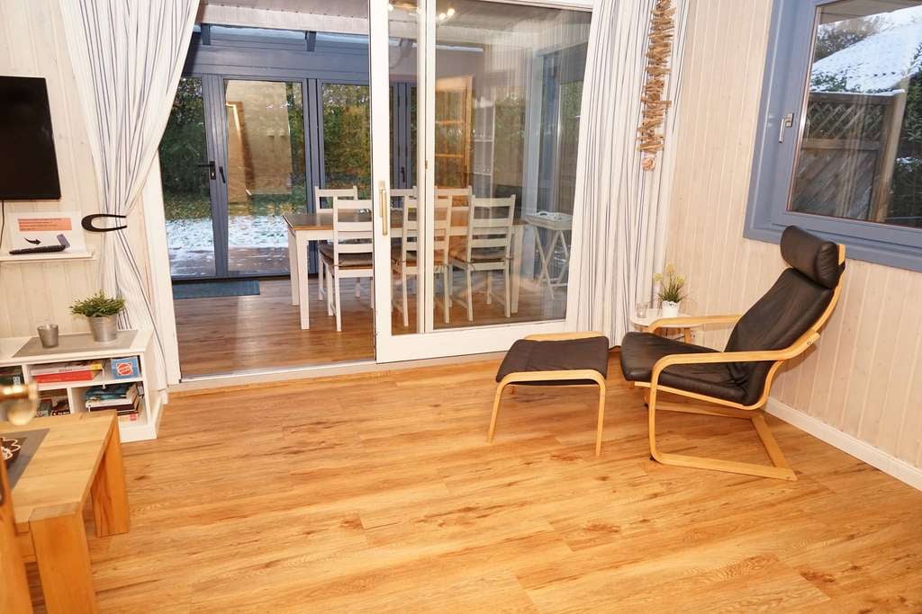 Immobilie in Damp - Blockhaus in TOP-Lage mit großem Grundstück und Wintergarten - Bild 4