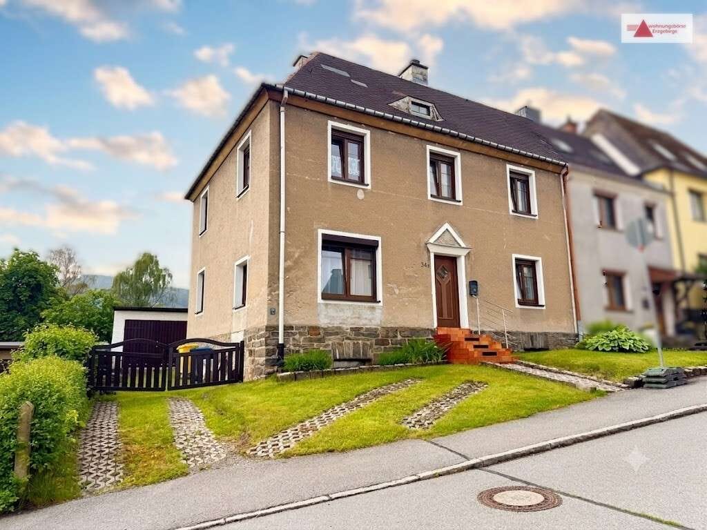 Immobilie in Annaberg-Buchholz - Platz für die Familie mit Pöhlbergblick: Doppelhaushälfte mit Garten & Garage in Annaberg-Buchholz - Bild 0