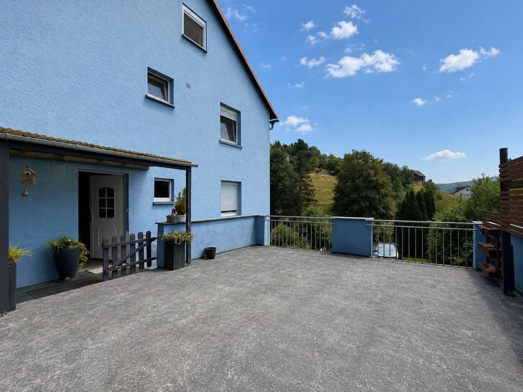 Immobilie in Oberzent - Großzügiges Reihenendhaus mit schönem Gartenparadies und vielseitigen Nutzungsmöglichkeiten - Bild 1
