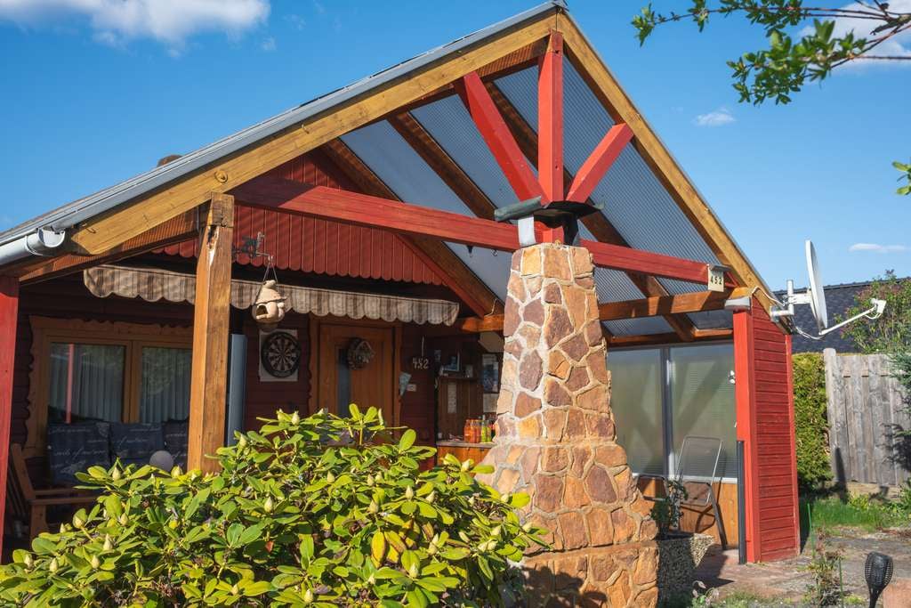 Immobilie in Sassenburg - Charmantes Blockhaus am Bernsteinsee | 3 Zimmer | 511 m² Grundstück - Bild 0