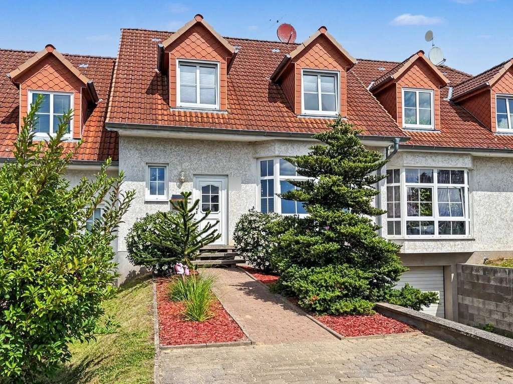 Immobilie in Kröpelin - Einziehen und Wohlfühlen: Gepflegtes Reihenmittelhaus mit 3 Schlafzimmern und Garten in Kröpelin - Bild 0