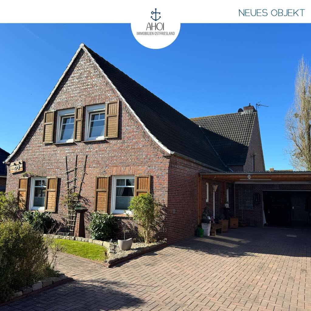 Immobilie in Südbrookmerland - Großzügiges Einfamilienhaus mit Wintergarten, schönem Garten und Garage in Sackgassenlage - Bild 0