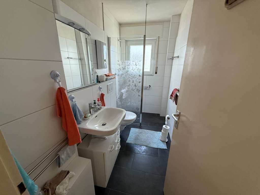 Immobilie in Eggenstein-Leopoldshafen - Attraktives Dreifamilienhäuser mit Balkonen & 2 Garagen - Bild 2