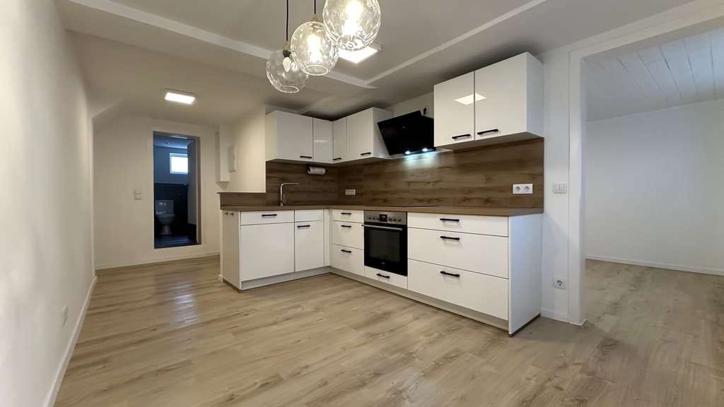 Immobilie in Dornburg - Modernisiertes Reiheneckhaus mit Garten, Garage und Einligerwohnung in Frickhofen - Bild 2