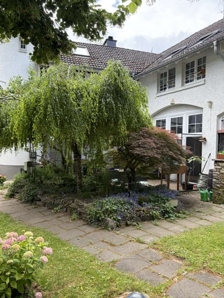 Immobilie in Walluf - Eigentumswohnung mit großem Grundstück in idyllischer Grünlage von Walluf - Bild 1
