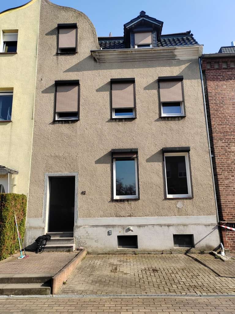 Immobilie in Raguhn-Jeßnitz - Reihenmittelhaus in Jeßnitz (Anhalt) mit Garten - Bild 0