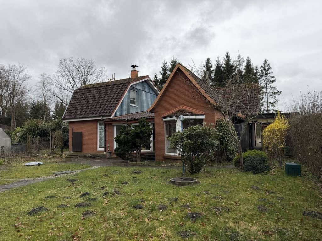 Immobilie in Kutenholz - Ein Zweifamilienhaus, dass alles kann - einziehen, vermieten oder beides - Bild 0