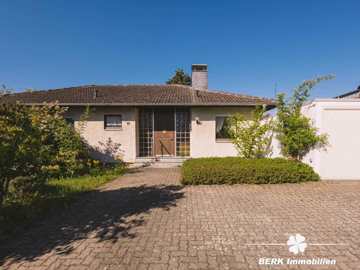 Immobilie in Sulzbach am Main - BERK Immobilien – Charmanter Bungalow mit Gartenidylle und viel Potenzial in Sulzbach am Main - Bild 0