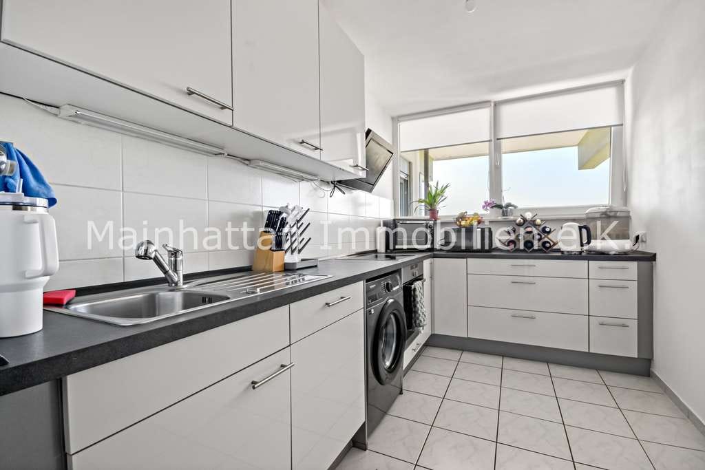Immobilie in Hattersheim - Planbare Mieteinnahmen statt Risiko …vermietete 2 Zimmerwohnung mit Balkon und Weitblick - Bild 4