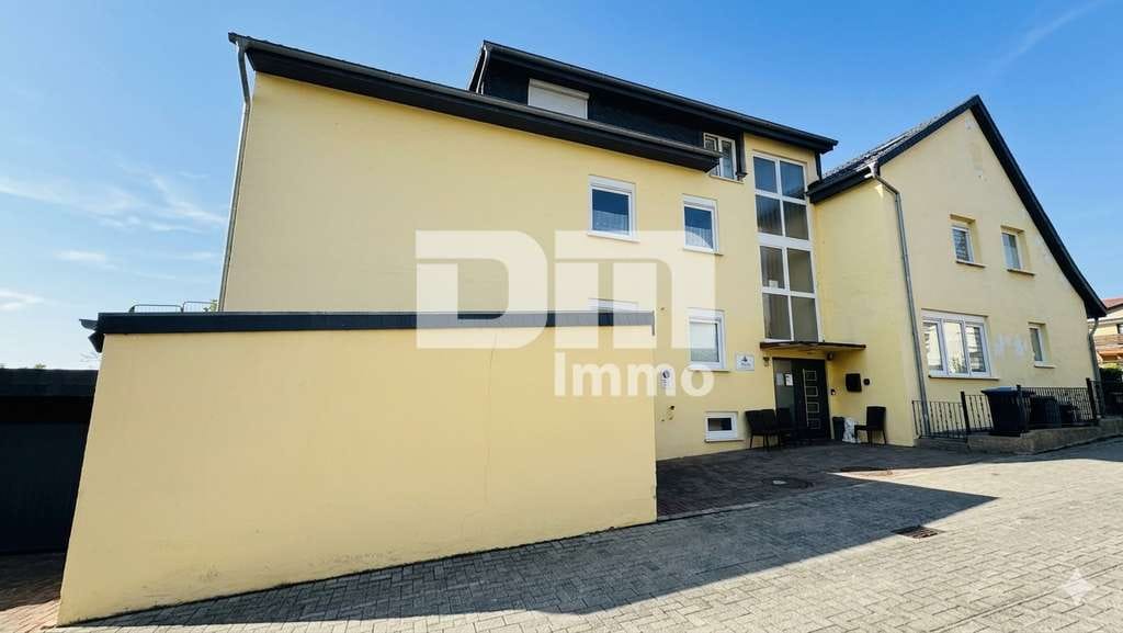 Immobilie in Northeim - Vielseitiges Immobilien-Ensemble mit 2 modernisierten Haushälften + Carport und Garten/Terrasse - Bild 3