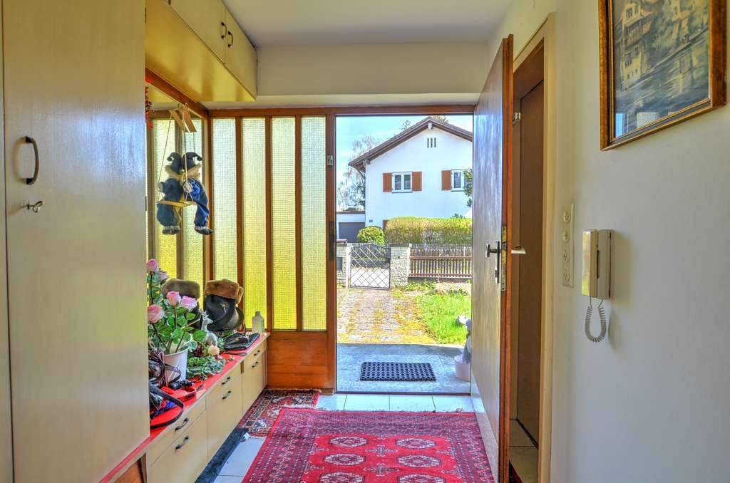 Immobilie in Sauerlach - Sonniges Südgrundstück mit Einfamilienhaus und Einliegerwohnung! - Bild 1
