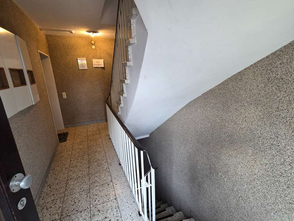 Immobilie in Gronau - Kleine vermietete Dachgeschosswohnung mit Balkon in Gronau - Bild 1