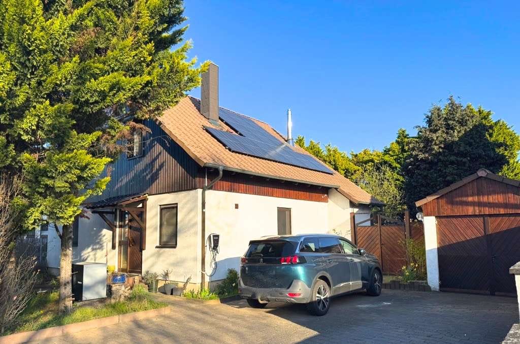 Immobilie in Eich - Einfamilienhaus mit herrlichem Garten und Garage in 67575 Eich am Rhein - Bild 0