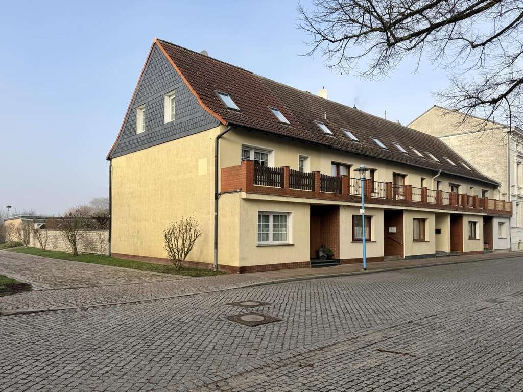 Immobilie in Wittenberge - Reihenmittelhaus mit Gartenidylle im Stadtkern von Wittenberge – nur wenige Schritte von der Elbe  - Bild 1