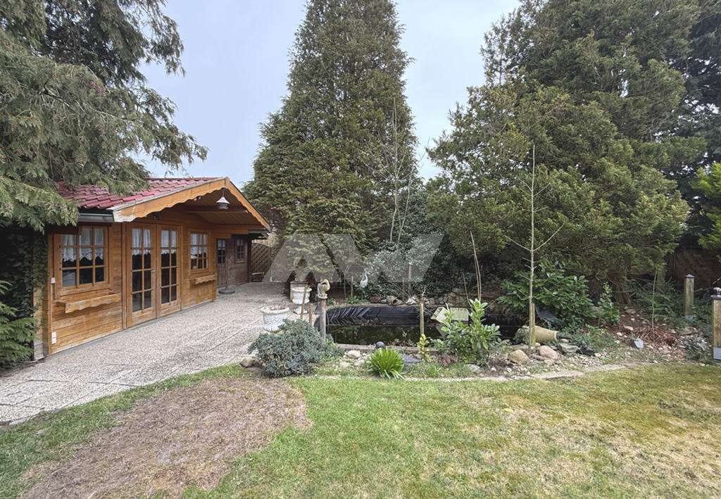 Immobilie in Hinte - Gepflegtes Wohnhaus mit Wintergarten und parkähnlichem Garten in Hinte - Bild 4