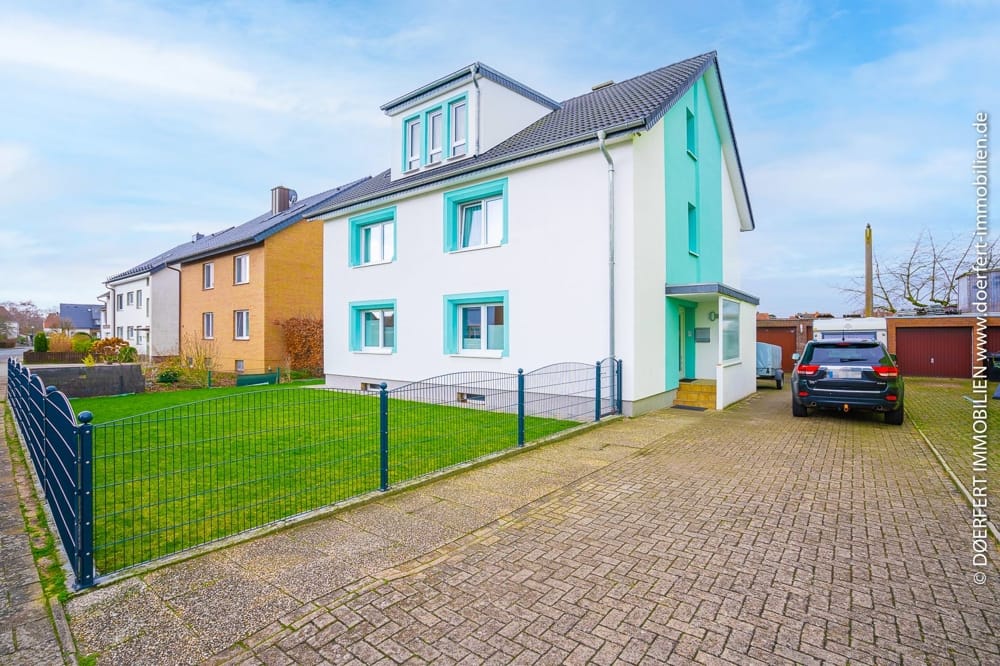 Immobilie in Bissendorf - Osnabrück - Bissendorf | Mehrfamilienhaus mit Terrassenbereich in sehr zentraler und ruhiger Lage - Bild 1