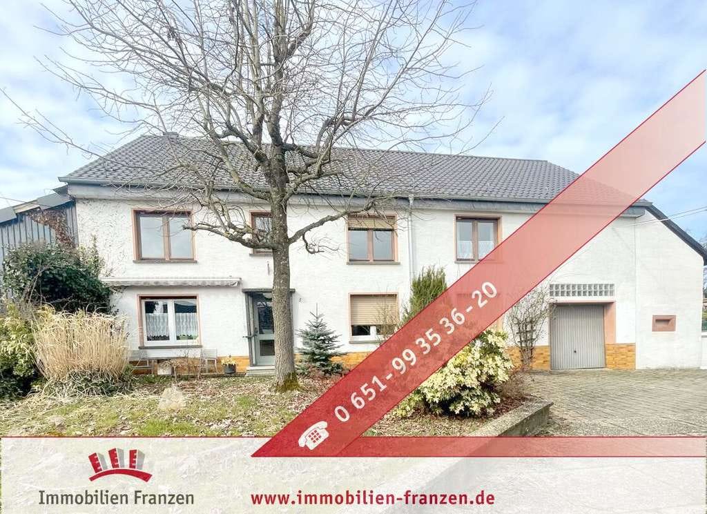 Immobilie in Schillingen - Vielseitiges Einfamilienhaus mit  
7 Zimmern, saniertem Bad, Garage und Schuppen - Bild 0