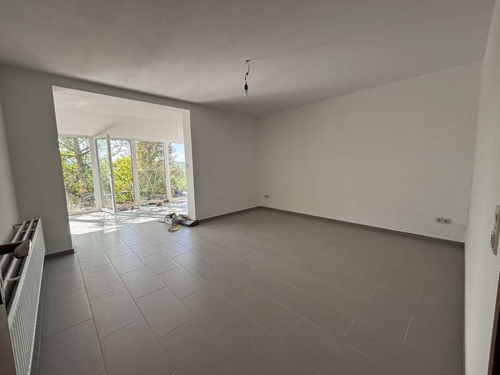 Immobilie in Gusterath - Helle Souterrain-Wohnung mit großem Garten in Gusterath - Bild 1