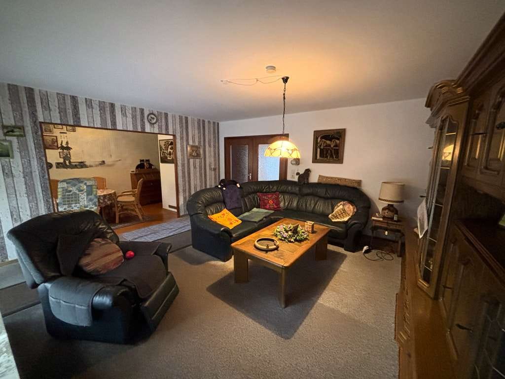 Immobilie in Nienburg/Weser - Gemütliches Einfamilienhaus in ansprechender Wohnlage mit großem Garten, Teich und Garage! - Bild 2