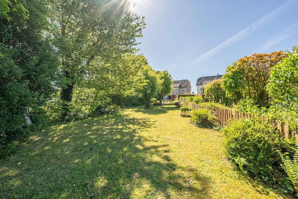 Immobilie in Castrop-Rauxel - Vielseitiges Dreifamilienhaus mit großem Grundstück und 4 Garagen - Bild 4