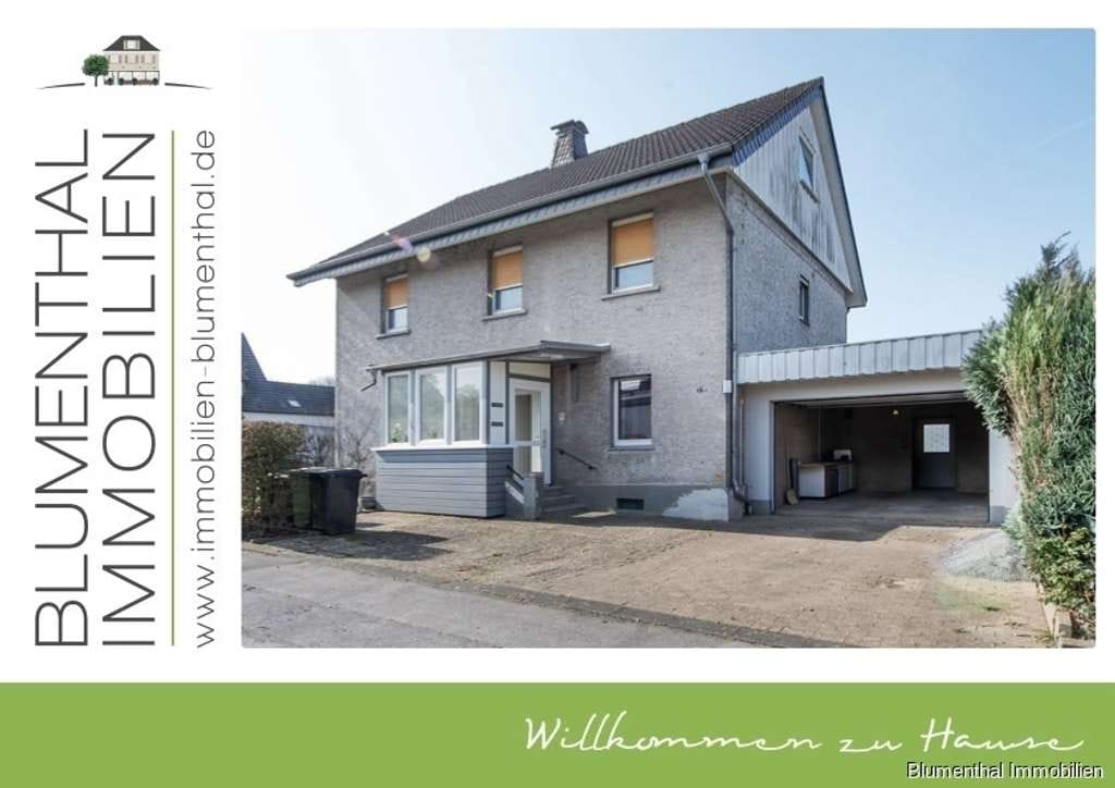 Immobilie in Enger - Zweifamilienhaus mit großzügigem Garten gen Süden in Westerenger - Bild 0