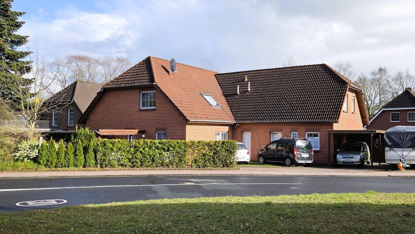 Immobilie in Uplengen - Attraktives Mehrfamilienhaus mit drei Wohneinheiten in zentraler Lage von Remels! - Bild 2