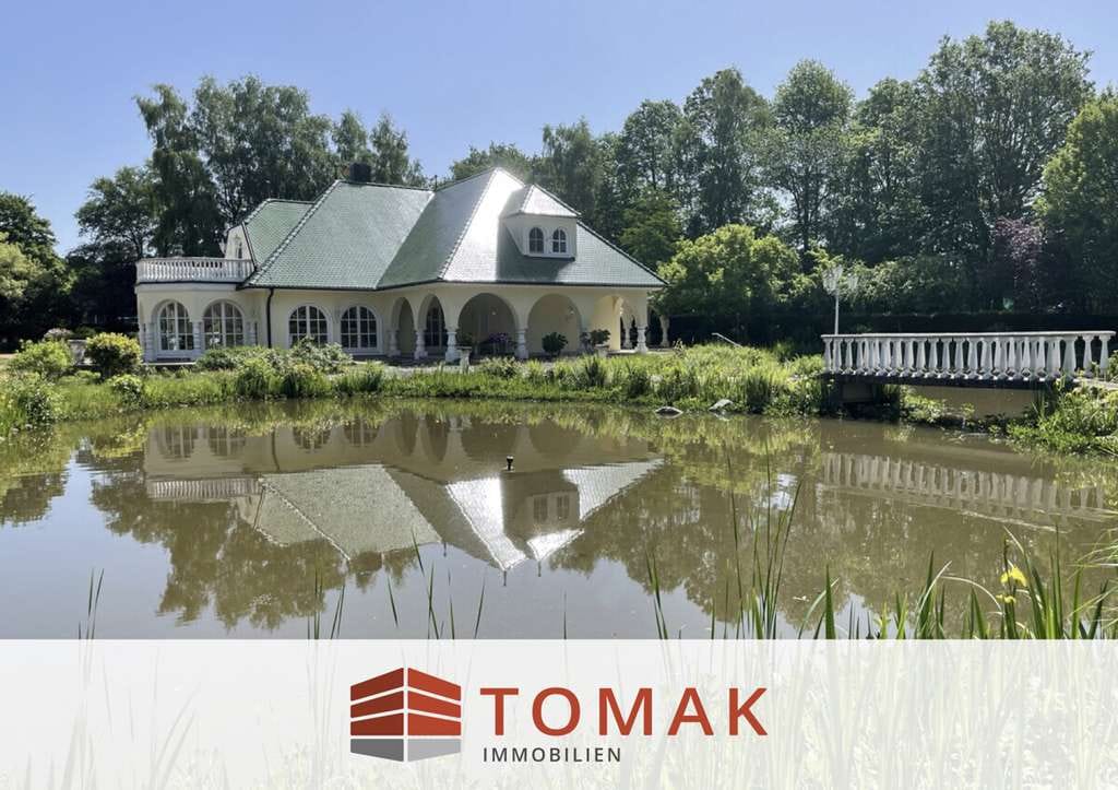 Immobilie in Harpstedt - Einzigartige Villa mit Spa & Innenpool auf parkähnlichem Seegrundstück - Bild 0