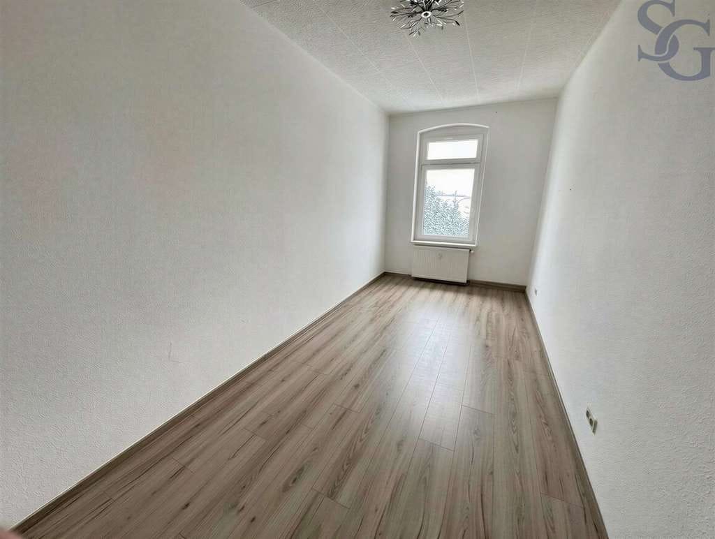 Immobilie in Leisnig - Einmalige Gelegenheit! Bezugsfertige Wohnung mit Dachgeschossrohling zum Ausbau - Bild 2