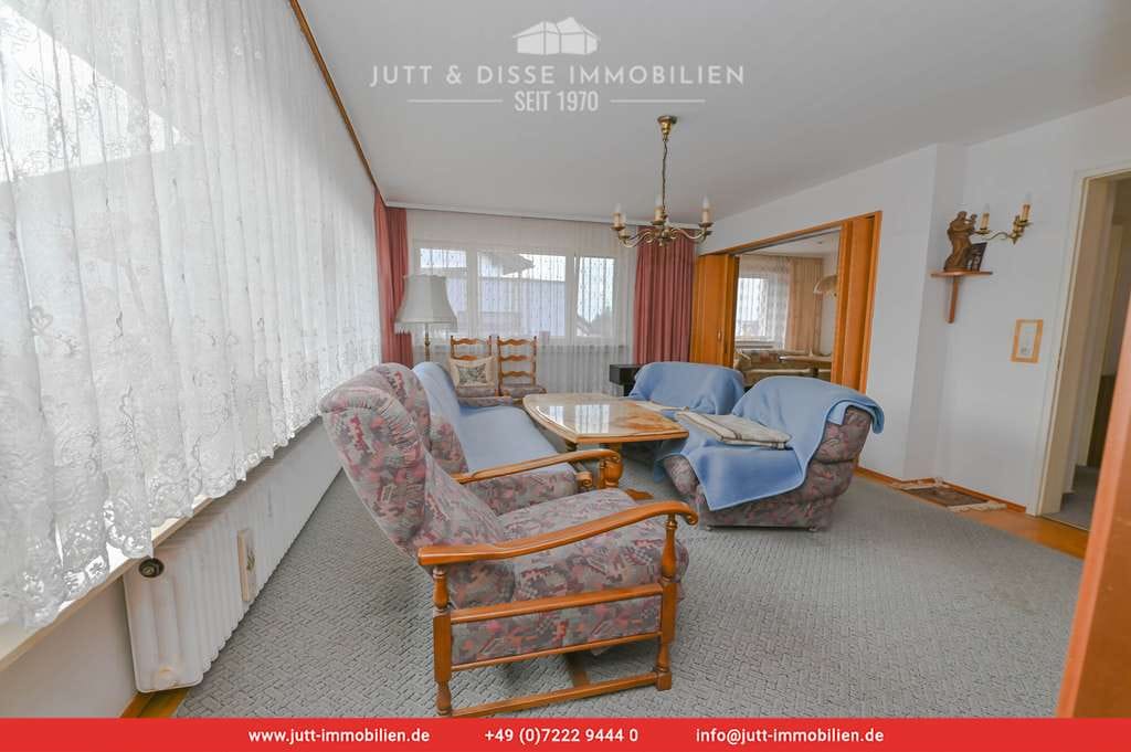 Immobilie in Kuppenheim - Bezugsfreies Dreifamilienhaus mit sonnigem Gartengrundstück und 3 Garagen in Kuppenheim - Bild 1