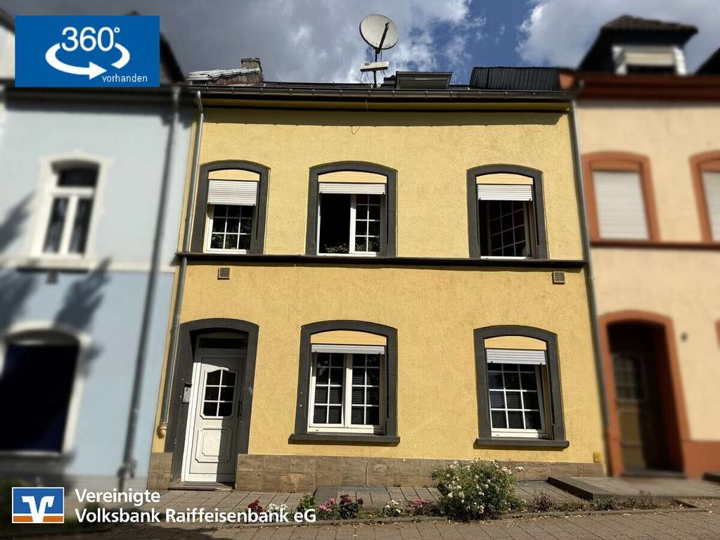 Immobilie in Wittlich - Vermietetes Stadthaus mit zwei Wohnungen und Stellplätzen - Bild 0