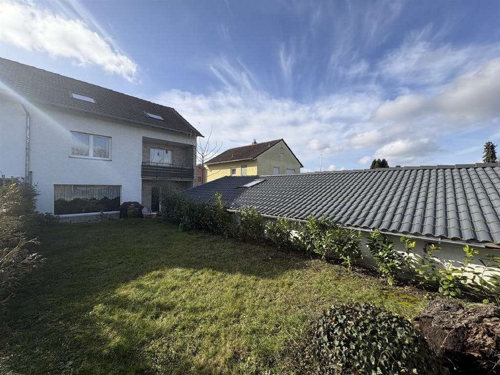 Immobilie in Stadecken-Elsheim - Großzügiges Einfamilienhaus mit Terrasse und Garten in Feldrandlage - Bild 1