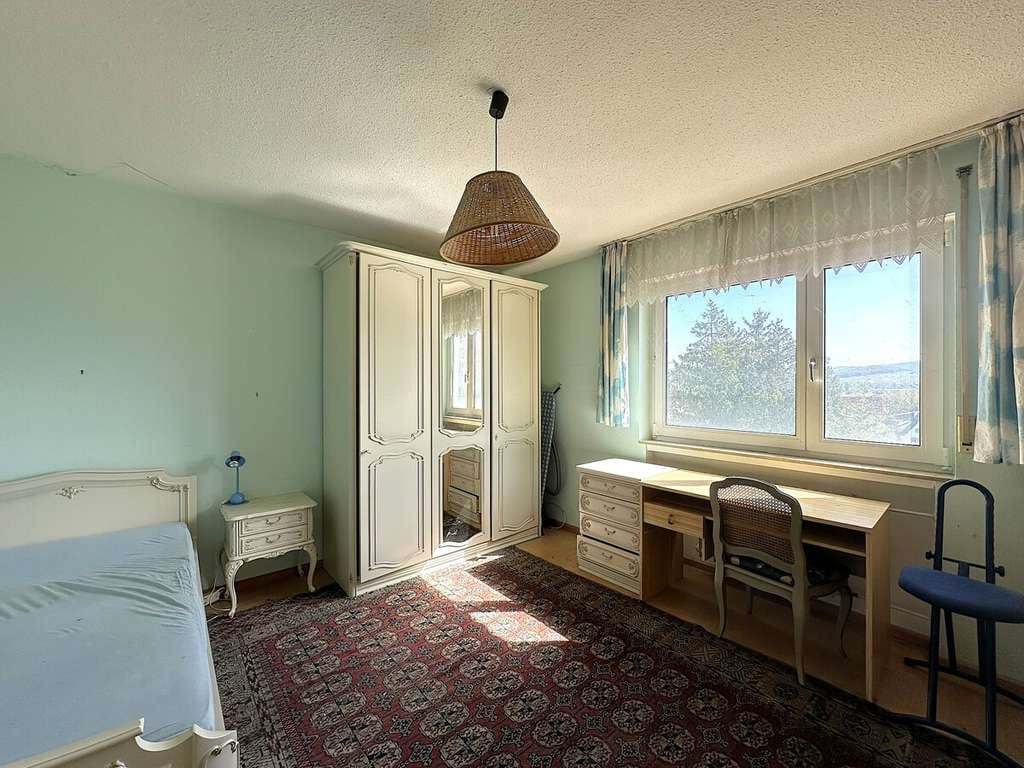 Immobilie in Bad Krozingen - Charmante, renovierungsbedürftige 2-Zimmerwohnung mit Aufzug und Garage in gepflegter Wohnanlage - Bild 1