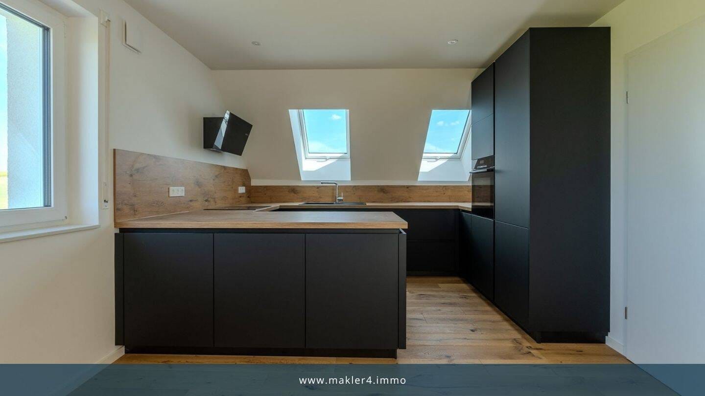 Immobilie in Poppenhausen - Sanierte 3-Zimmer-Wohnung mit Weitblick und Energieklasse A+ - Bild 0