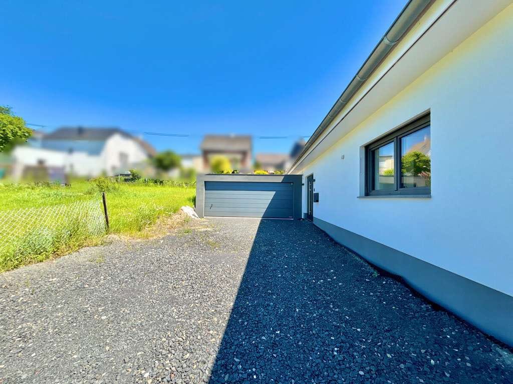 Immobilie in Unnau - **Energieeffizienter Neubau-Bungalow mit besonders hochwertiger Ausstattung in Unnau / Stangenrod** - Bild 3