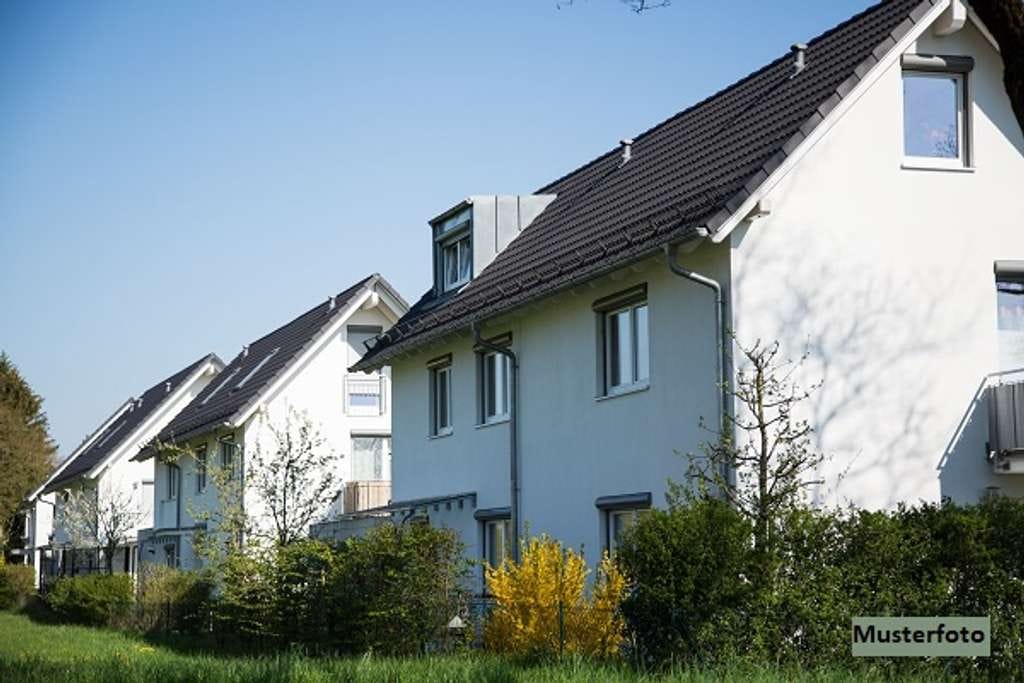 Immobilie in Südbrookmerland - 2-Familienhaus mit überdachter Terrasse und Wintergarten - Bild 0