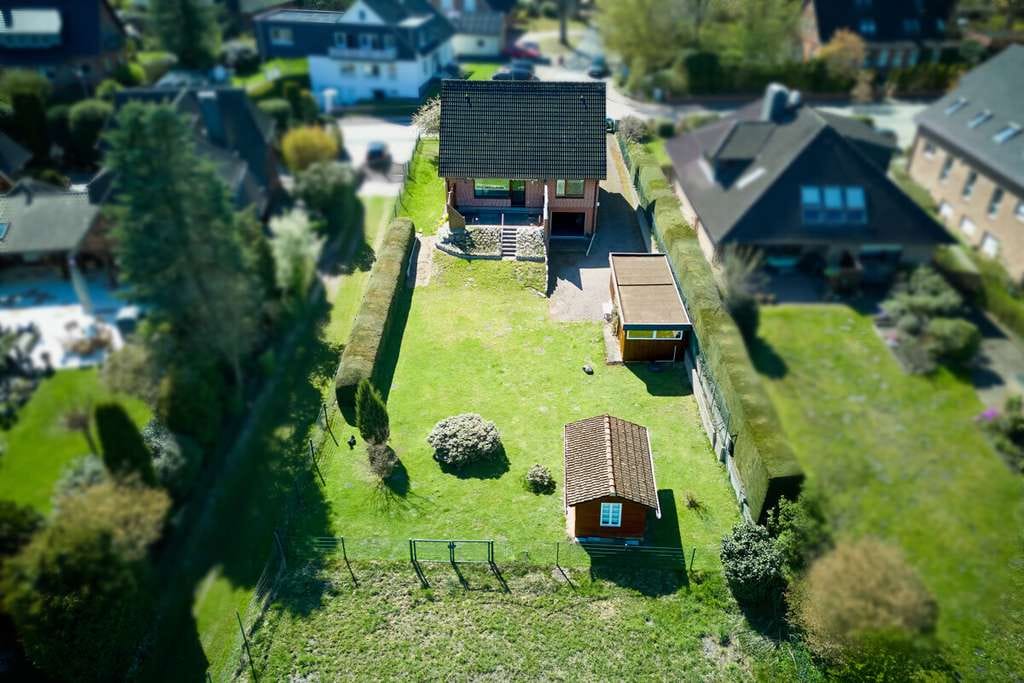 Immobilie in Hanstedt - Familienfreundliches Wohnen mit großem Grundstück und freiem Blick ins Grüne in Hanstedt - Bild 1
