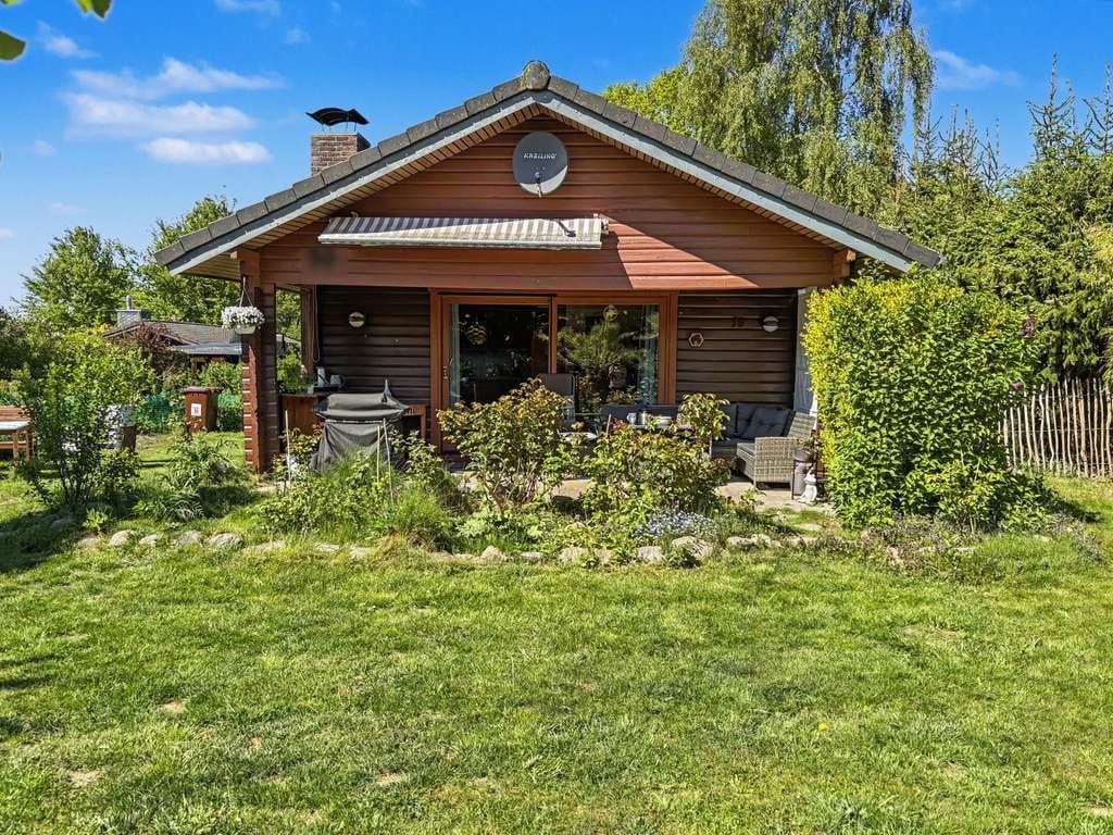 Immobilie in Brekendorf - Dänisches Blockbohlenhaus mit modernem Wohlfühlfaktor in Brekendorf - Bild 0