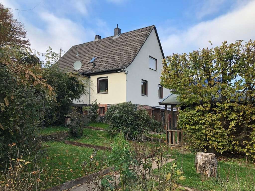 Immobilie in Grebenau - Einfamilienhaus mit Gartenparadies und Scheune - Bild 1