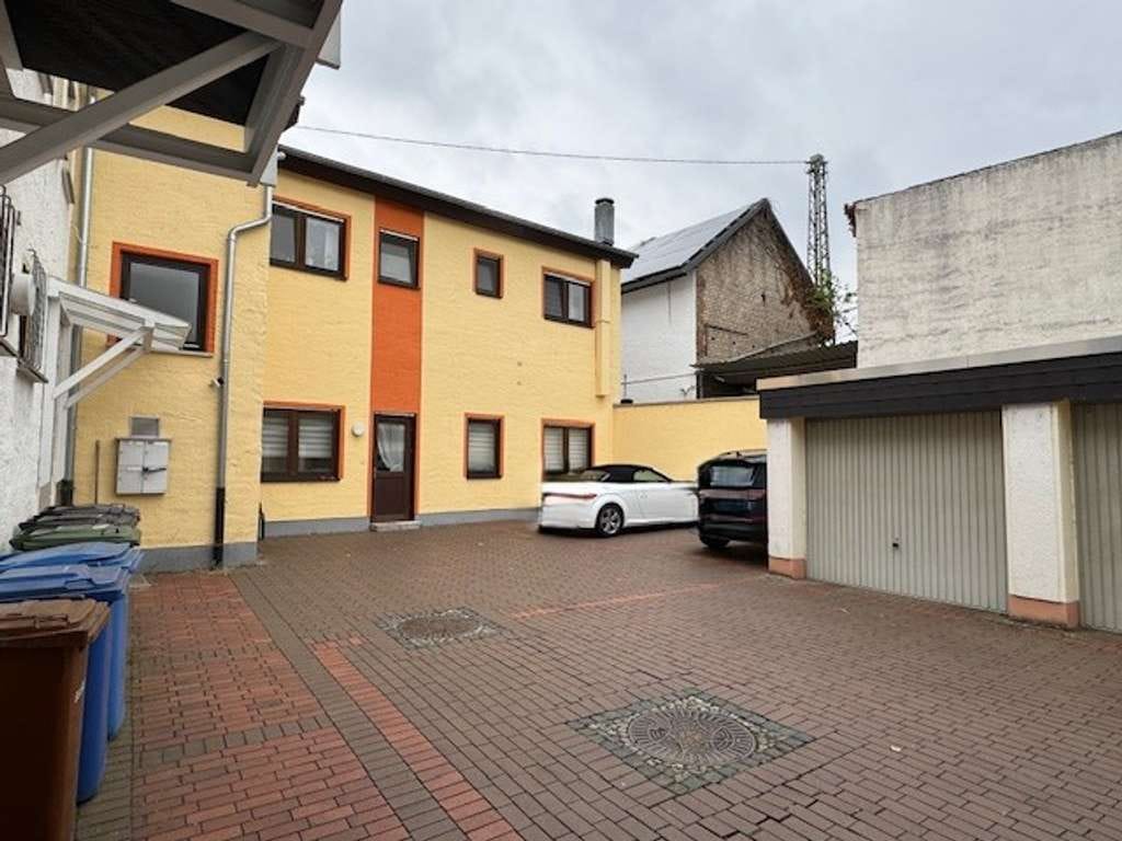 Immobilie in Neuwied - Heimbach-Weis, Wohnhaus mit Gewerbeteil zu verkaufen - Bild 1