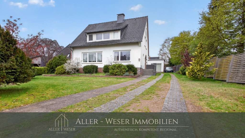 Immobilie in Bruchhausen-Vilsen - Bruchhausen-Vilsen | Vielseitiges Einfamilienhaus in zentraler Lage mit Garten und Garage - Bild 0