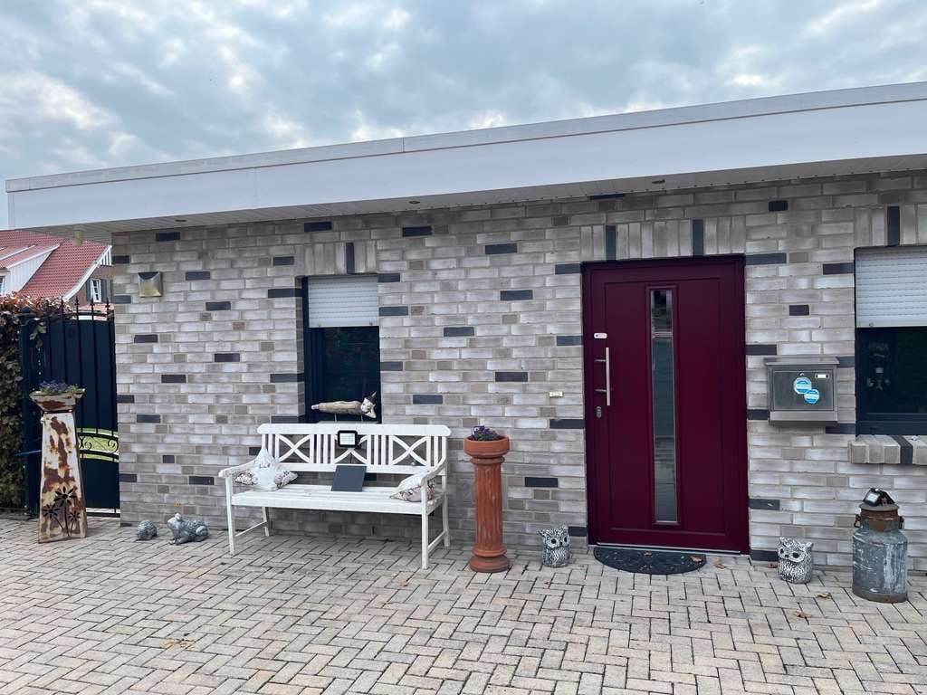 Immobilie in Goldenstedt - Top gepflegter Bungalow mit Außen-Swimmingpool - Bild 1