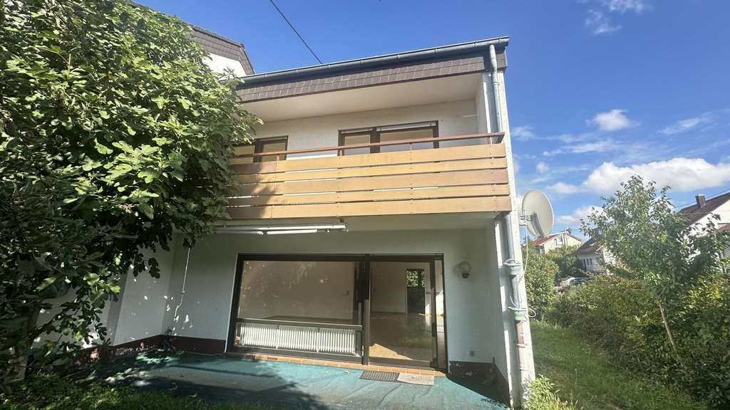Immobilie in Bretten - Vermietetes Einfamilienhaus (DHH) mit Garten in ruhiger Wohnlage von Bretten-Diedelsheim - Bild 1