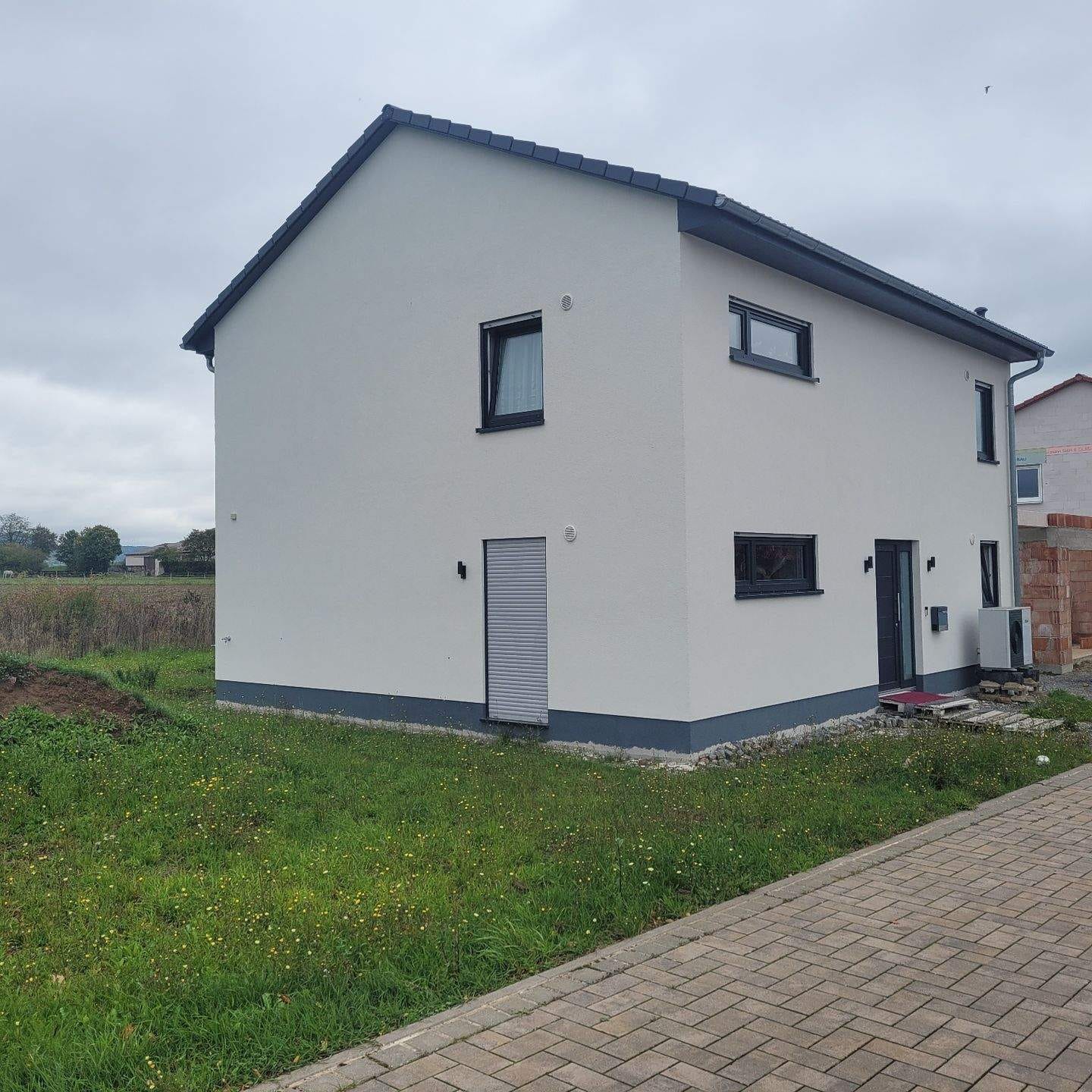 Immobilie in Elfershausen - Neuwertiges Einfamilienhaus in Elfershausen  - Bild 0