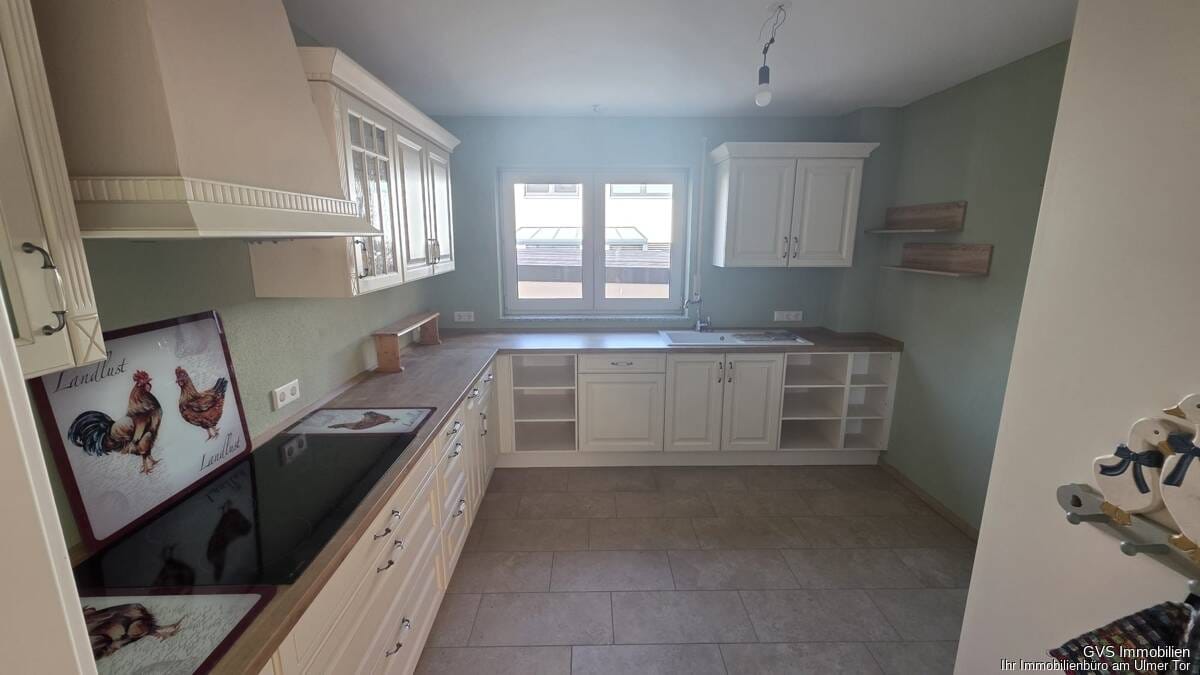 Immobilie in Niederrieden - 4,5 Zimmer-Wohnung mit Garten und 2-Zimmer-Einliegerwohnung, sep. Eingänge,Stellplätze und Terrassen - Bild 1