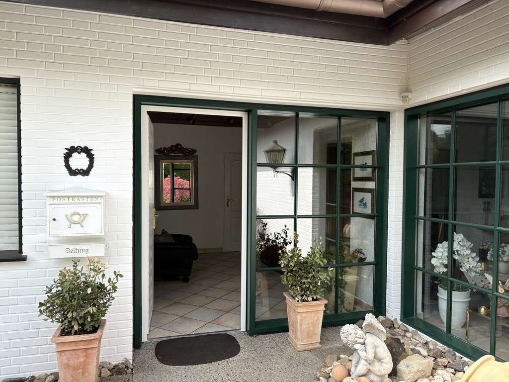 Immobilie in Warendorf - Großzügiger, modern geschnittener Eckbungalow mit Kamin, gepflegtem Garten & Garagen, beste Wohnlage - Bild 4