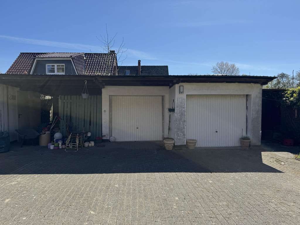 Immobilie in Wurster Nordseeküste - Siedlungshaus mit Anbau und 2 Garagen - Bild 3