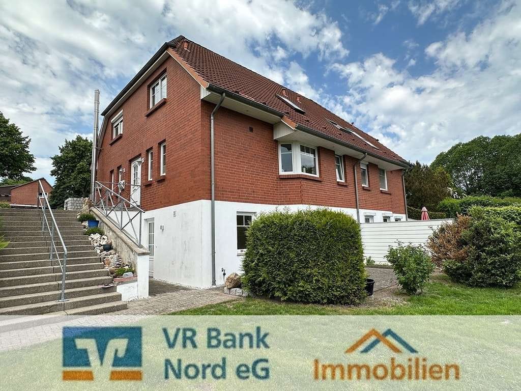 Immobilie in Wees - Großzügige Doppelhaushälfte mit Einliegerwohnung - Bild 0